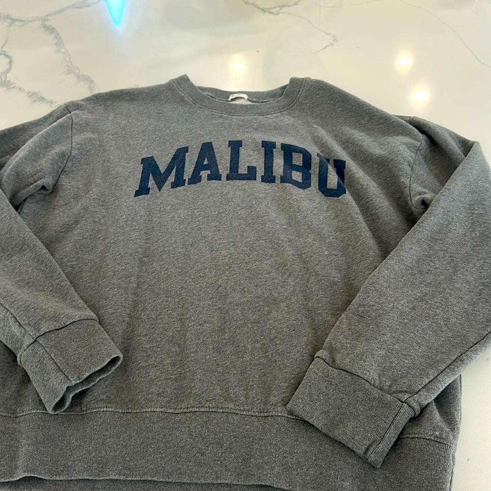 One size fits all. Malibu crewneck sweatshirt.